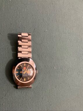 LPA Silver Men’s Bracelet Watch with Black Dial and Gold Accents